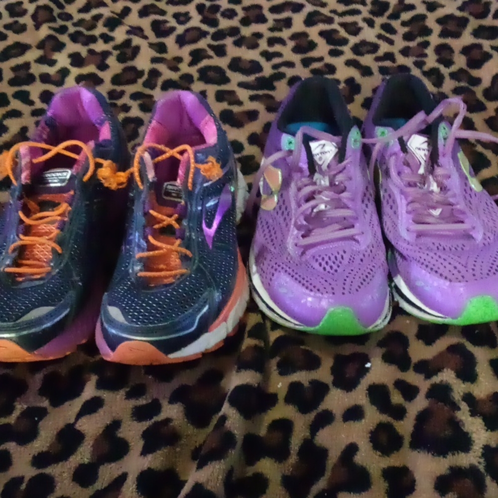A pair of newton and brooks gts  newton 8.5 Brooks 8